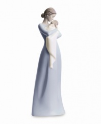 There's simply nothing on earth like a mother's embrace. Beautifully evoking the sweet simplicity of this unparalleled experience, this figurine is delicately crafted in fine porcelain with simple painted hues and a high gloss finish. Measures 12.5 x 4.