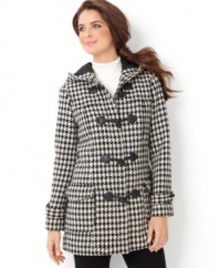 Punch up your outerwear look with this cozy houndstooth coat. The graphic pattern and chic A-line shape make it an unexpected classic!