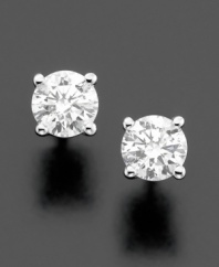 Fill every day with a touch of elegance. These pristine stud earrings feature round-cut diamond (1-1/2 ct. t.w.) set in 14k white gold.