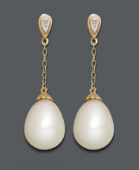 Sophisticated style perfect for the office or an evening out. Elegant drops feature cultured freshwater pearls (8 x 11 mm) strung from delicate chains crafted in 14k gold with sparkling diamond-accented posts. Approximate drop: 1-1/10 inches.