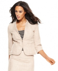 This stylish workplace essential cinches at the middle, making it an ideal form-flattering jacket from DKNYC.