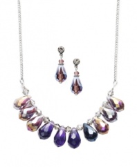A vivid display. Take on the latest trend in c.A.K.e. by Ali Khan's bubbly style. Amethyst-hued faceted glass stones combine for a totally chic look. Set in silver tone mixed metal. Approximate length: 14 inches + 2-1/2-inch extender. Approximate drop drop width: 3 inches. Approximate earring drop: 3/4 inch.