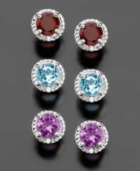 Fill your look with fabulous color. This three pair set by Victoria Townsend includes sterling silver stud earrings featuring round-cut blue topaz (2 ct. t.w.), round-cut garnet ( 2 ct. t.w.) and round-cut amethyst (1-3/8 ct. t.w.).