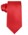 Smooth sophistication and modern convenience go hand in hand with this solid machine washable tie from John Ashford.