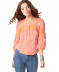 Free People's crinkled top has an inset lace detail that lends an air of vintage charm to your look! Pair it with flats and skinny jeans for a casual, day-time outfit.