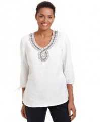 A beaded neckline and stylish drawstring cuffs give this petite top by JM Collection an exotic feel. Pair with denim for a day off or wear to soften the look of crisp black pants.