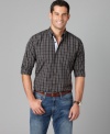 Crafted in a crisp, clean plaid, this lightweight shirt from Tommy Hilfiger will easily become a casual must-have.