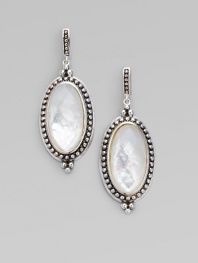 A simply chic design with an oval mother-of-pearl doublet surrounded by a delicate band of dots. Mother-of-pearl doubletsSterling silverEurowire backLength, about ¾Imported 