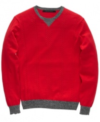Cable guy. This sweater from Sean John elevates a classic look with cool, streetwise styling.