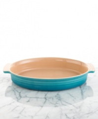 Create your famous lasagna, scalloped potatoes, even warm spinach dip in this versatile stoneware dish. Its durable finish can transfer from the freezer to the oven or microwave and will not absorb the flavor or odor of foods. Resists cracks and chips for years of use.