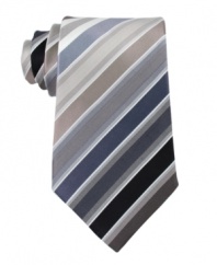 Enter neutral territory with this classic striped tie from Kenneth Cole Reaction.