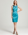 Rosettes at the neckline add feminine flourish to this ultra-sleek Elie Tahari sheath dress.
