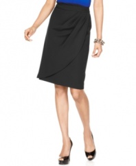 Add a side-swept look to your work ensemble with this skirt, featuring a wrap-like look that pairs perfectly with other pieces from Nine West's collection of suiting separates.