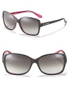 Stylish oversized rectangle sunglasses with a contrast interior for a fun pop of color.
