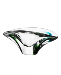 A dream-provoking piece. Masterfully crafted from delicate crystal, this striking bowl with hints of luminous green catches the eye and adds a whimsical accent to your tranquil space. Beautiful harmony flows from the soft edges and defined shape of this peaceful addition.