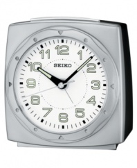 Subtly styled with modern details, this fine alarm clock from Seiko keeps you moving to the beat of your own. Rectangular silvertone mixed metal case. Round white dial with logo, numeral indices, ascending beep alarm with snooze, backlight and luminous hands. Battery included. Measures approximately 4 x 4-3/8 x 2-2/3. One-year limited warranty.
