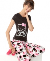 Cute as a kitten. This stretchy sleep t-shirt by Hello Kitty features a large graphic and allover burnout pattern in the shape of her signature bows.