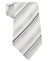 Kenneth Cole Reaction adds modern minimalism to the gradient grid tie, making it a cool update for your Monday through Friday routine