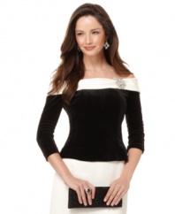 Alex Evenings' off-the-shoulder top is fashioned from a luxe velvet and outfitted with boning at the bodice for a defined fit. A brooch at the left shoulder finishes this pretty, festive look.