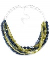 A perfectly serene style. Kenneth Cole New York's chic torsade necklace features multiple strands of cat's eye in tranquil blue and green hues. Strung from a silver tone mixed metal chain. Approximate length: 17 inches + 3-inch extender.