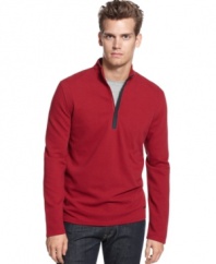 This quarter-zip sweater from Calvin Klein takes your layered look to the next level of style.