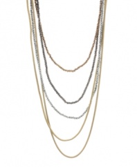 Beautiful beadwork. Five rows of chic beaded strands make a striking statement on this Kenneth Cole necklace. Set in silver tone, gold tone and bronze tone mixed metal. Approximate length: 27 inches + 3-inch extender.