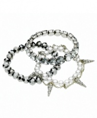 Chic and complementary. Three different kinds of stretch bracelets--including metallic beaded and sparkling glass accent and crystal versions, as well an imitation pearl and spike style--have an eclectic effect on this set from GUESS. The stretch design ensures a comfortable, flexible fit. Approximate diameter: 2-1/4 inches.