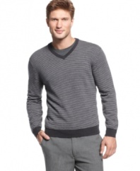 Smooth and lightweight merino wool pairs up with a sleek stripe in this modern-meets-refined v-neck sweater from Club Room. (Clearance)