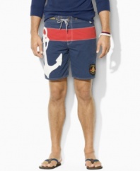 A classic-fitting swim trunk is crafted in a quick-drying cotton-nylon blend with nautical details.