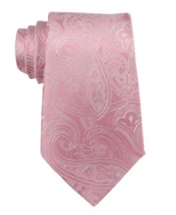A tonal paisley pattern in a rosy palette lets this Sean John tie instantly warms up any charcoal gray suit.