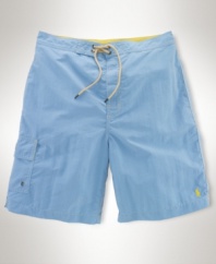 A quick-drying swim short is designed for a classic fit in a preppy plaid print for an authentic look.