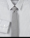 Slightly textured pindot tie adds finishing touches to any modern dress wardrobe.57% cotton/43% silkDry cleanMade in USA