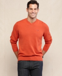 Nothing says casual style like the pairing of a v-neck sweater like this from Tommy Hilfiger with your favorite denim for a timelessly cool look.