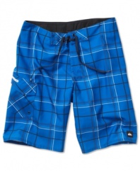 Check it out: a fresh pair of funky shorts from Quiksilver lets you hit the beach in style.