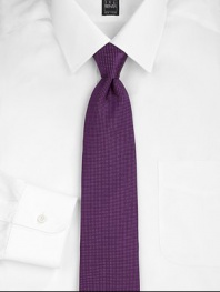 An intricate pindot pattern woven with premiere silk luxury. Silk; dry clean Made in USA 