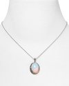A classically glam look from Judith Jack. Glittering crystals frame a large opal stone with luminescent milky depth - the perfect pendant for chiffon with a plunging neckline.