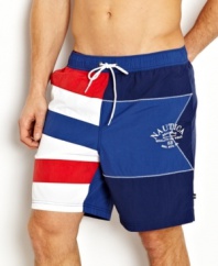 Fly the flag. These color-block board shorts from Nautica are beach-worthy trunks to take you into the surf in comfort.