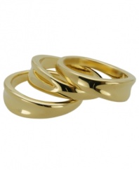Gold rush. Crafted in gold tone mixed metal with a highly polished surface, GUESS' classically chic trio of stackable rings will add effortless elegance to your daytime style. Size 7.