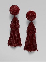 A rich, fully beaded design in a tassel style. Glass beadsDrop, about 3¼Clip-on backImported 