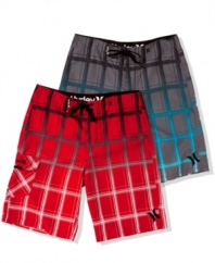 Catch a wave in rad beach style. These swim shorts from Hurley are your summer style staple.