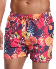 Get paradisaical with these swim trunks from Lacoste that are flush with tropical color.