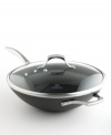 Enjoy stir-fried veggies and Asian-style entrees at their best. The Calphalon Unison  flat-bottom wok ensures easy, effective high-heat cooking with traditional sloped sides and an exclusive Sear nonstick cooking surface to lock in flavors. Lifetime warranty.