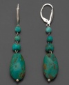 Go for a progressive look. These gorgeous earrings feature off-shape baroque turquoise set in sterling silver. Approximate drop: 2 inches.