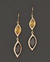 Pavé diamonds frame faceted smoky quartz and orange citrine gems, set in 18K gold leaves. By Carelle.
