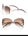 This sleek design boasts a ridged metal frame with hook detailed temples for a truely unique look. Available in shiny rose gold/havana with brown gradient lens. Hook detailed temples100% UV protectionMade in Italy 