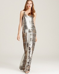 Gilded in sparkling sequins, this glamorous BCBGMAXAZRIA maxi dress touts side pockets for an unexpected casual edge.