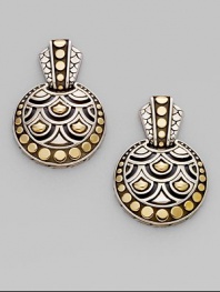 From the Naga Collection. A stunning design, these disc-shaped drop earrings combine dots and arcs, sterling silver and 18k gold, in a collection that feels both tribal and modern.18k yellow gold and sterling silver Drop, about 1 Post back Made in Bali