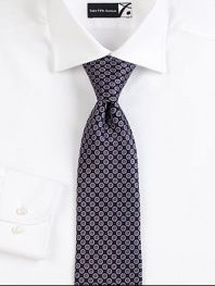 Mini medallion print design defines this handsomely crafted tie of superior Italian silk.SilkDry cleanMade in Italy