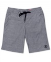 Summer starts here. Lock down your casual look with these sweet board shorts from Volcom.