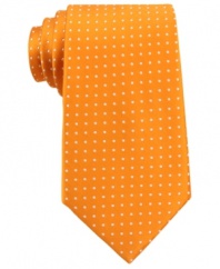 Get spotted. With a citrus punch, this Tommy Hilfiger tie gives your work wardrobe a fresh update.